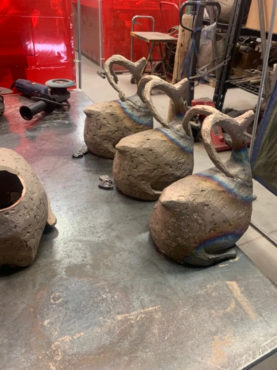 Cast bodies and horns waiting to be welded together